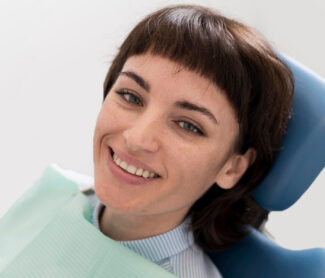 Smiling girl at dental office in Chelmsford, MA.